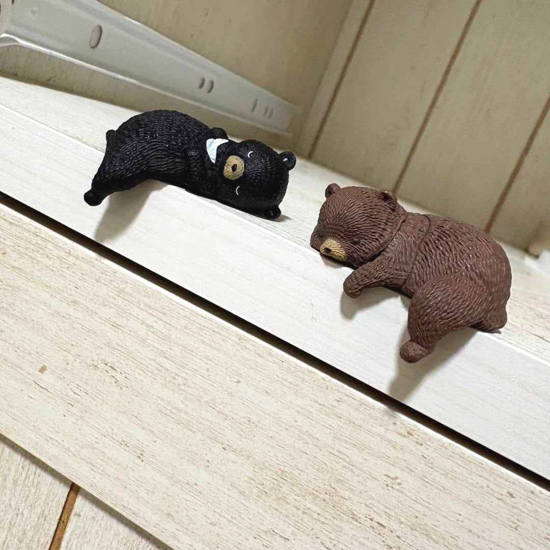 YELL Bear Figure Resting on Edge