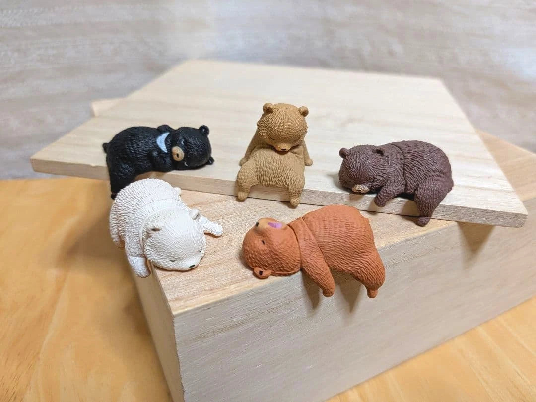 YELL Bear Figure Resting on Edge